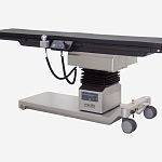 Новый операционный стол с карбоновой столешницей для гибридных операционных, производства Medifa (Германия).